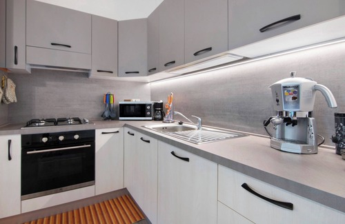 Consiglio di Rumo Apartment | Apartment "Orange Corner - Gravedona" with Mountain View, Terrace & Wi-Fi