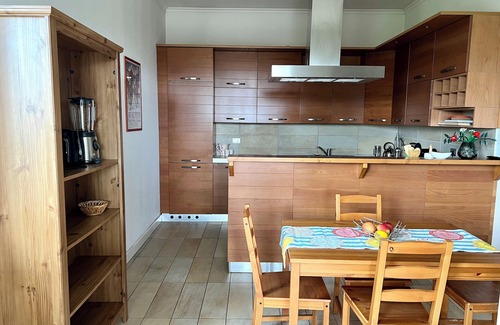 Zona XVI Torrenova Apartment | Apartment surrounded by greenery with a view of the riding stables. With meter at 30m.