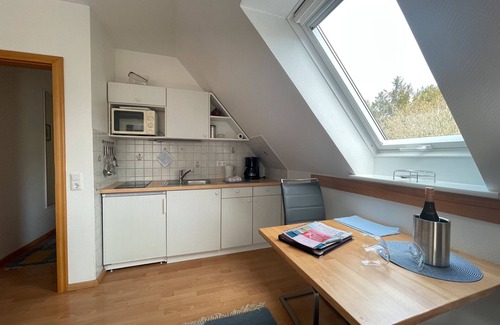 Steenodde Apartment | Apartment 'Tanga' with Shared Garden and Wi-Fi