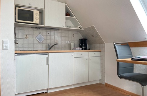 Steenodde Apartment | Apartment 'Tanga' with Shared Garden and Wi-Fi