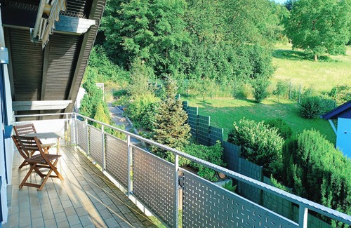 Lautenbach Apartment | Apartment with panoramic balcony with reading material, games and fitness room
