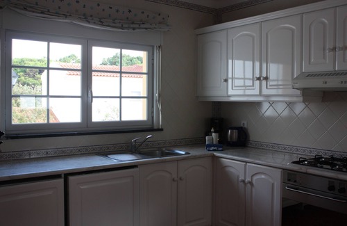 Praia del Rei Apartment | Apartment With Shared Pool, landscaped gardens, Wi-fi