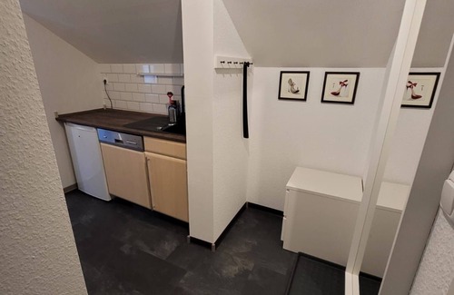 Burg Stargard Apartment | Apartment without fireplace in the attic - Onkmangani Appartmenthaus Oelschläger