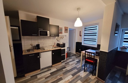 Burg Stargard Apartment | Apartment without fireplace in the attic - Onkmangani Appartmenthaus Oelschläger