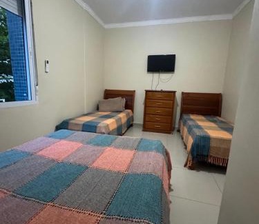 Pitangueiras Apartment | Apto Natalino Broleze - Pé na areia