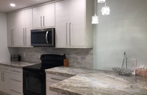 Whitney Beach House | Bayfront Longboat Key House with Pool and 3 min walk to the beach