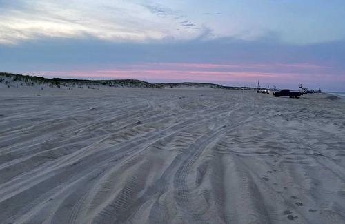 Caine Woods House | Bayside Bliss is the perfect beach getaway and a short walk from the beach