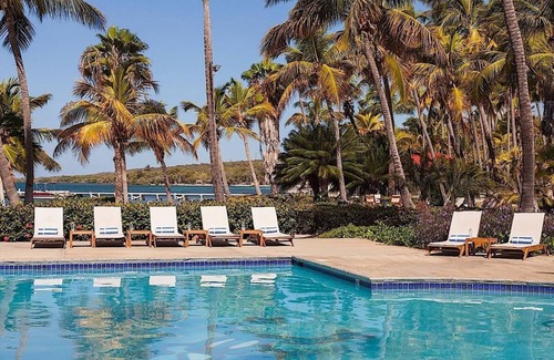 Carenero Apartment | Beachfront Dream! White Sand Beach, Pools, Family-Friendly, Parking!
