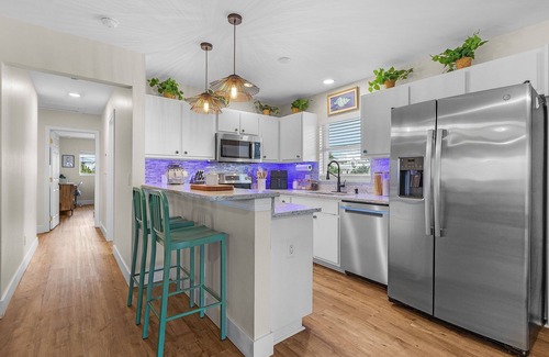 Pine Island Center House | Beautiful 3/3 Island Retreat with Heated Pool, Dock & Private Boat Ramp.