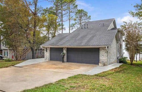 Onalaska House | Beautiful 3 Story Lake Front Home with boat lift!