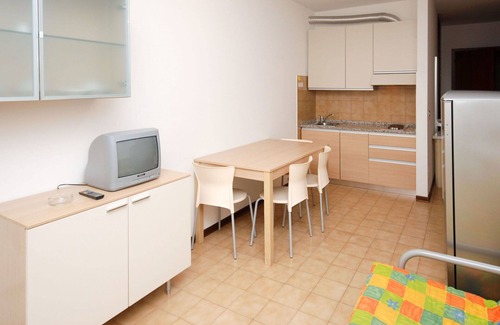 Lignano Sabbiadoro Apartment | Beautiful apartment for 4 guests with A/C, pool, TV, terrace and pets allowed