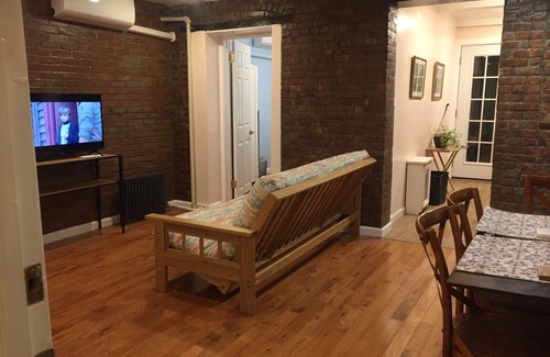 Concourse Apartment | Beautiful an spacious two bedroom complete apartment with deck and patio.