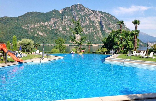 Bissone Apartment | Beautiful apartment for 4 guests with pool, A/C, WIFI, TV, balcony and panoramic view