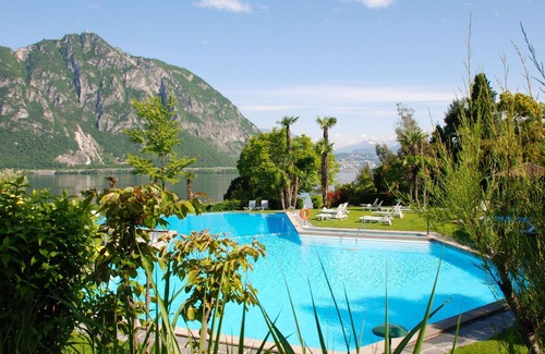 Bissone Apartment | Beautiful apartment for 4 guests with pool, A/C, WIFI, TV, balcony and panoramic view