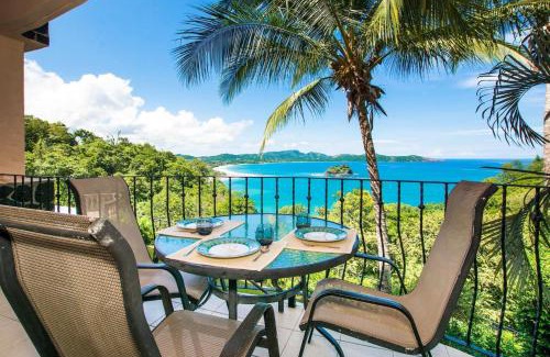Playa Flamingo House | Beautiful Condo in Peaceful Cliffside Location with a Private Balcony & Stunning Ocean and Mountain Views