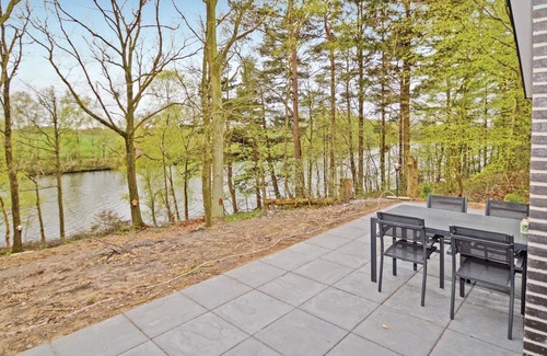 Brande House | Beautiful cottage in a unique location right by the river Skjern Å with good fishing grounds.