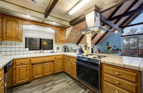Pine Cove House | Beautiful, dog-friendly cabin with large decks, forest views, jetted tub, & more