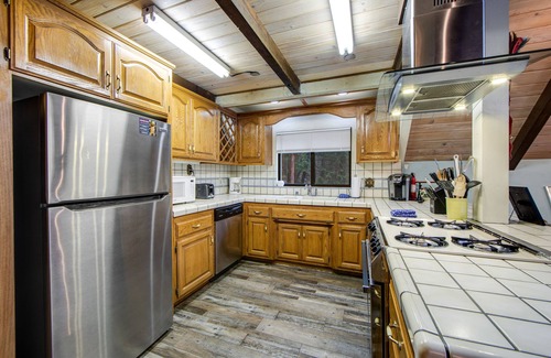 Pine Cove House | Beautiful, dog-friendly cabin with large decks, forest views, jetted tub, & more