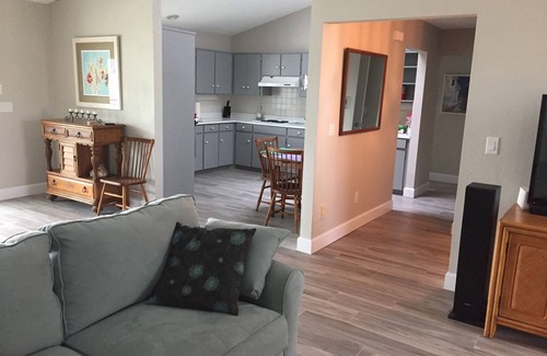 Ormond Beach House | Beautiful home steps to the beach with year round heated pool and spacious lanai