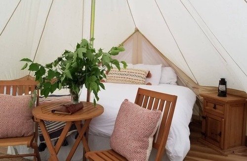 Rideau Lakes RV Rental | Beaver Bluff Safari Tent over the water with sauna