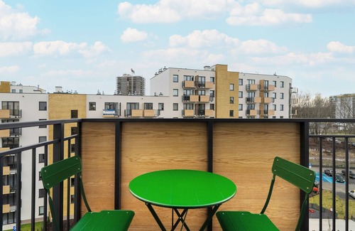Nowe Miasto Apartment | Black and Green Apartment by Renters