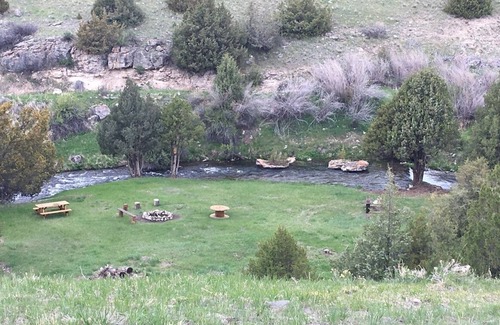 Shining Mountains Cabin | Blaine Creek Log Cabin with Spectacular views!