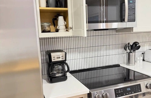 Palm Coast House | Boho Luxe Escape - Pet Friendly, Fire Pit, Grill, & Beach!