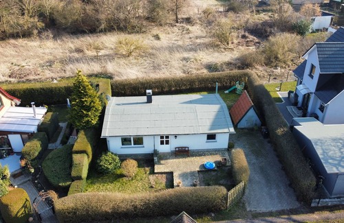Kirchdorf House | Boho-style bungalow on a natural beach.