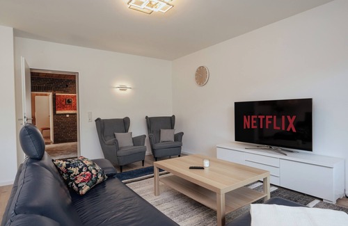 Hennef Apartment | Bonquartier | Modern apartment with workspaces, terrace & parking space