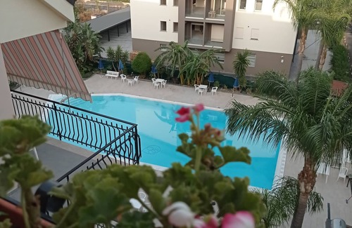 Calatabiano Apartment | Bouganville Residence - Family suite with swimming pool, tennis court, playground.