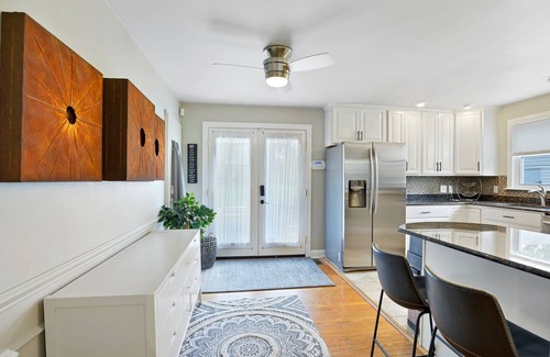 Parkville House | Boutique style home with original works of art on a gorgeous tree lined street.