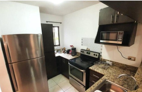 Heredia Apartment | Bright Apt w Pool Near the Airport - Self Check In