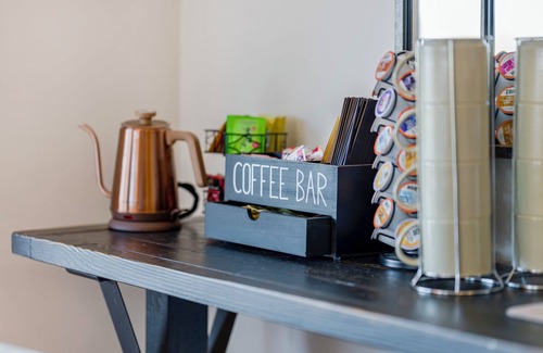 Cambridge House | Bright hilltop retreat with stunning mountain views, wrap-around windows, and cozy seating to take it all in. Nestled on a private, scenic property minutes from charming Cambridge village—perfect for a peaceful getaway year-round.