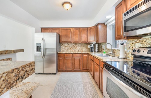 Harbor Village House | Bright Oasis Home w Pool & Palm Trees Near Beach!