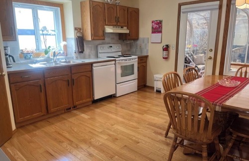 Cochrane House | Bright, spacious 4 bedroom home.