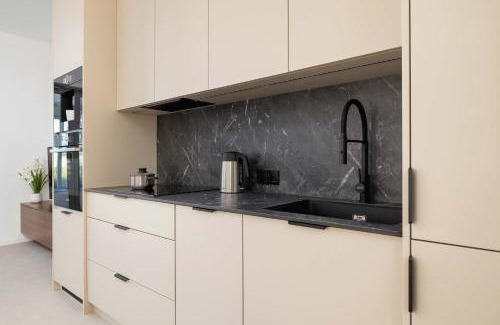 Katowice Apartment | Bright Studio in Katowice with Parking, Sauna & Gym by Noclegi Renters