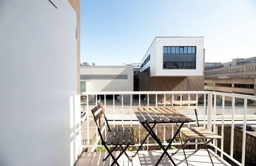 Gare Apartment | Bright & Stylish 2BR Apt in City Center