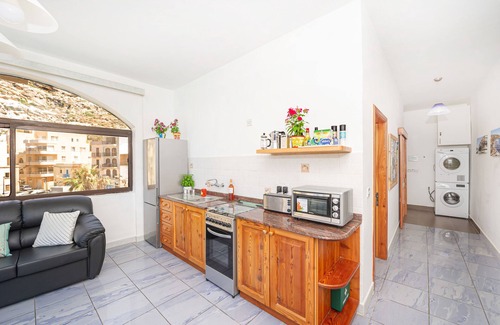 Munxar Apartment | Brilliant Beachfront Apartment with Super Sunset views in Xlendi Bay, Gozo Malta
