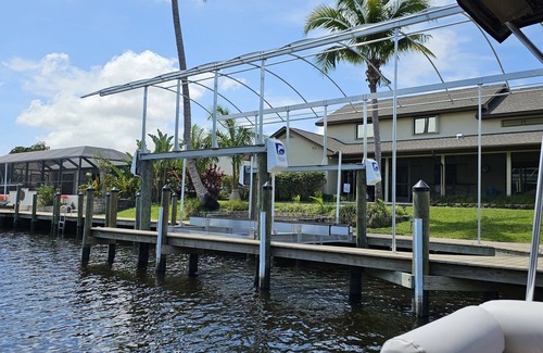 Lochmoor Waterway Estates House | Bring your boat to tie up to the new dock with easy access to the Caloosahatchee