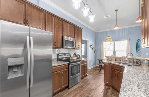 Navarre House | Bungalow; 4/2 spacious home + fire pit/game room