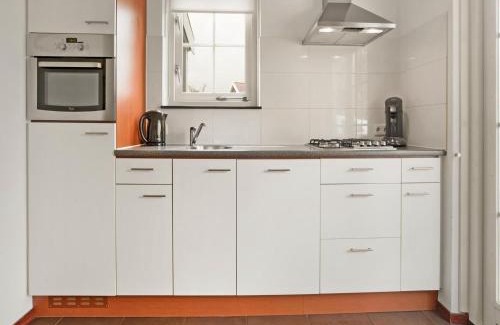 Municipality of Nissewaard House | Bungalow by Water with Sauna in South Holland