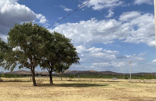 Cache RV Rental | Camp at the foothills of Wichita Wildlife Refuge & Mountains.