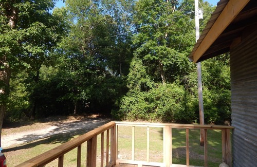 Perkinston Cabin | Camp House on Red Creek - Uncle Ralph’s Cabin Rentals - PRIVATE BEACH