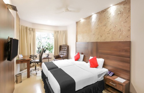 Mysore Hotel | Capital O 18430 The Dawn Hotel