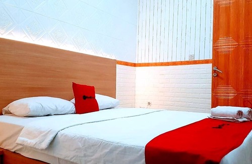 South Tangerang Hotel | Capital O 94359 Aurora Guest House
