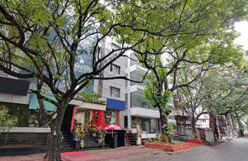 Jayanagar Hotel | Capital O Elegant Amethyst Business Hotel Near Ragigudda Sri Prasanna Anjaneyaswamy Temple