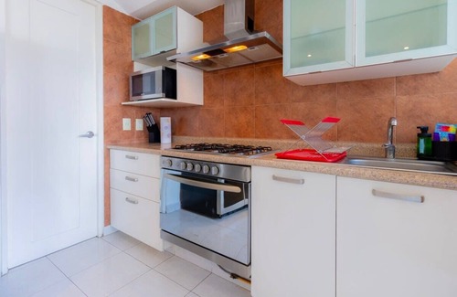 El Yaqui Condo | Capitalia - GYM - Garden - Parking