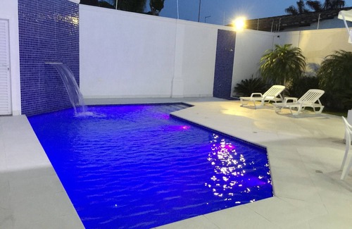 Balneario Praia do Pernambuco House | Casa Arvoredo - Live a unique experience! Swimming pool, barbecue and 4 suites