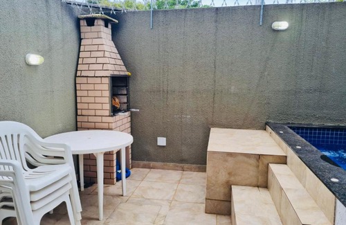 Vista Linda House | Casa com jacuzzi dentro de condomínio em Bertioga.