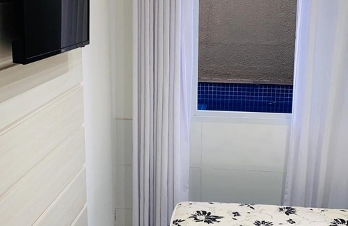 Vista Linda House | Casa com jacuzzi dentro de condomínio em Bertioga.